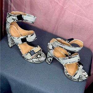 Size 7 heels worn once.